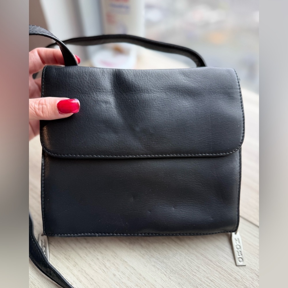 Vintage HOBO Black Leather Traveler’s Bag with Silver Accents